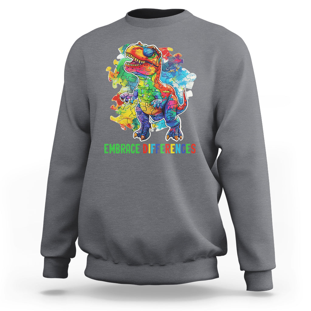 Charcoal gray crewneck sweatshirt with colorful dinosaur puzzle graphic and green slogan text.