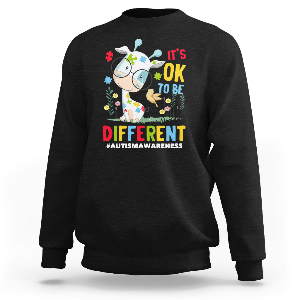 Black autism awareness sweatshirt with giraffe graphic and 'It’s OK to be different'