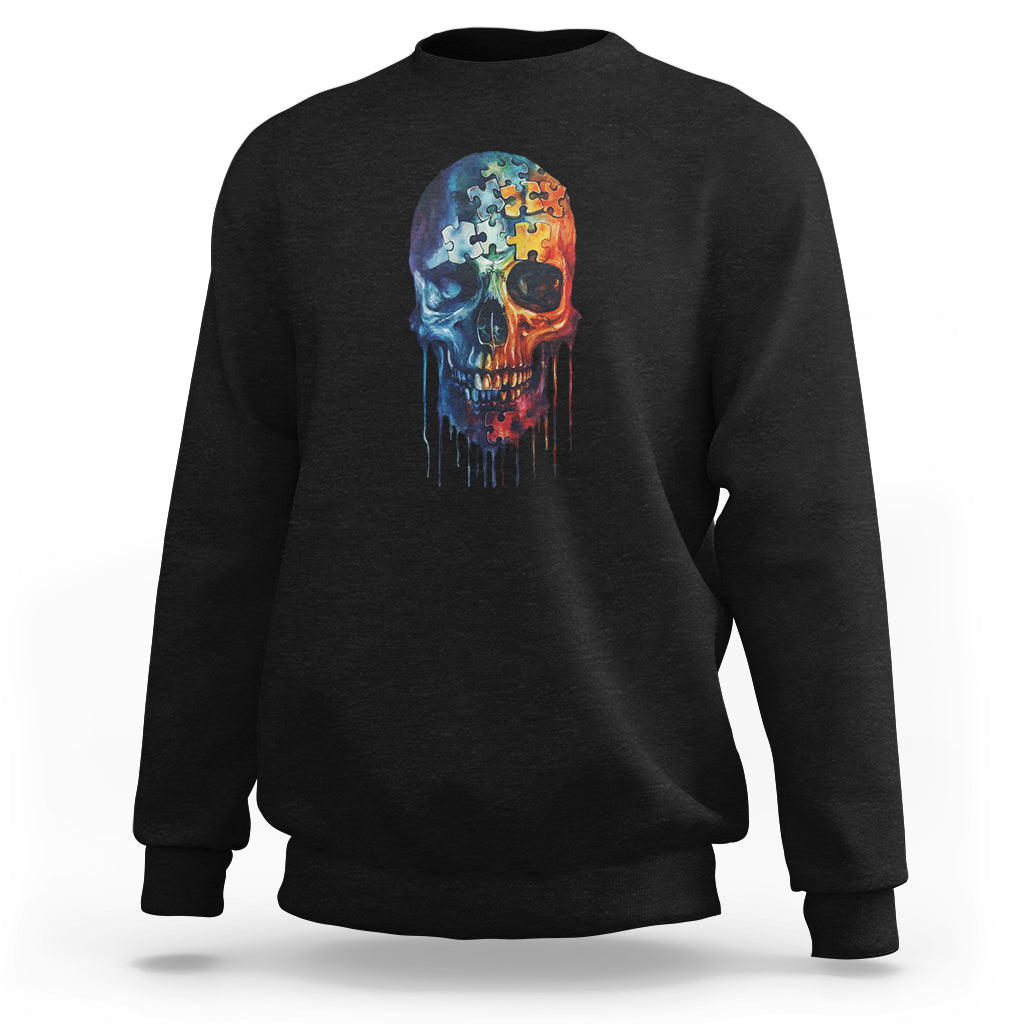 Black crewneck sweatshirt with colorful puzzle skull graphic on the chest.