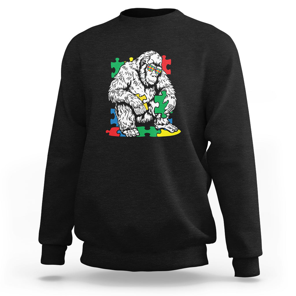 Black crewneck sweatshirt with Bigfoot puzzle warrior graphic on chest