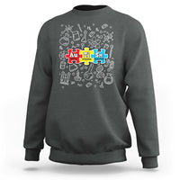 Dark heather gray sweatshirt with colorful science puzzle graphic on the chest.
