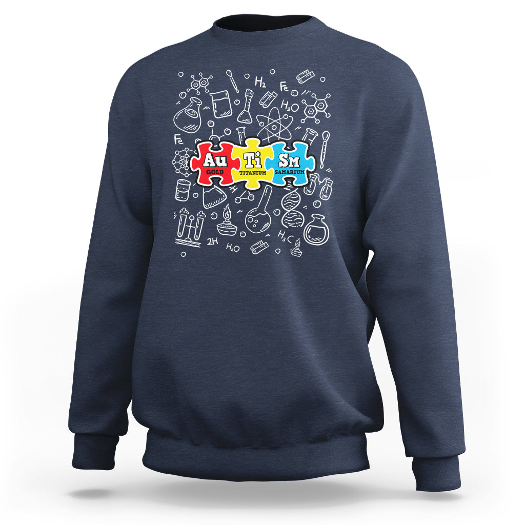 Navy sweatshirt with colorful science puzzle graphic on the chest.