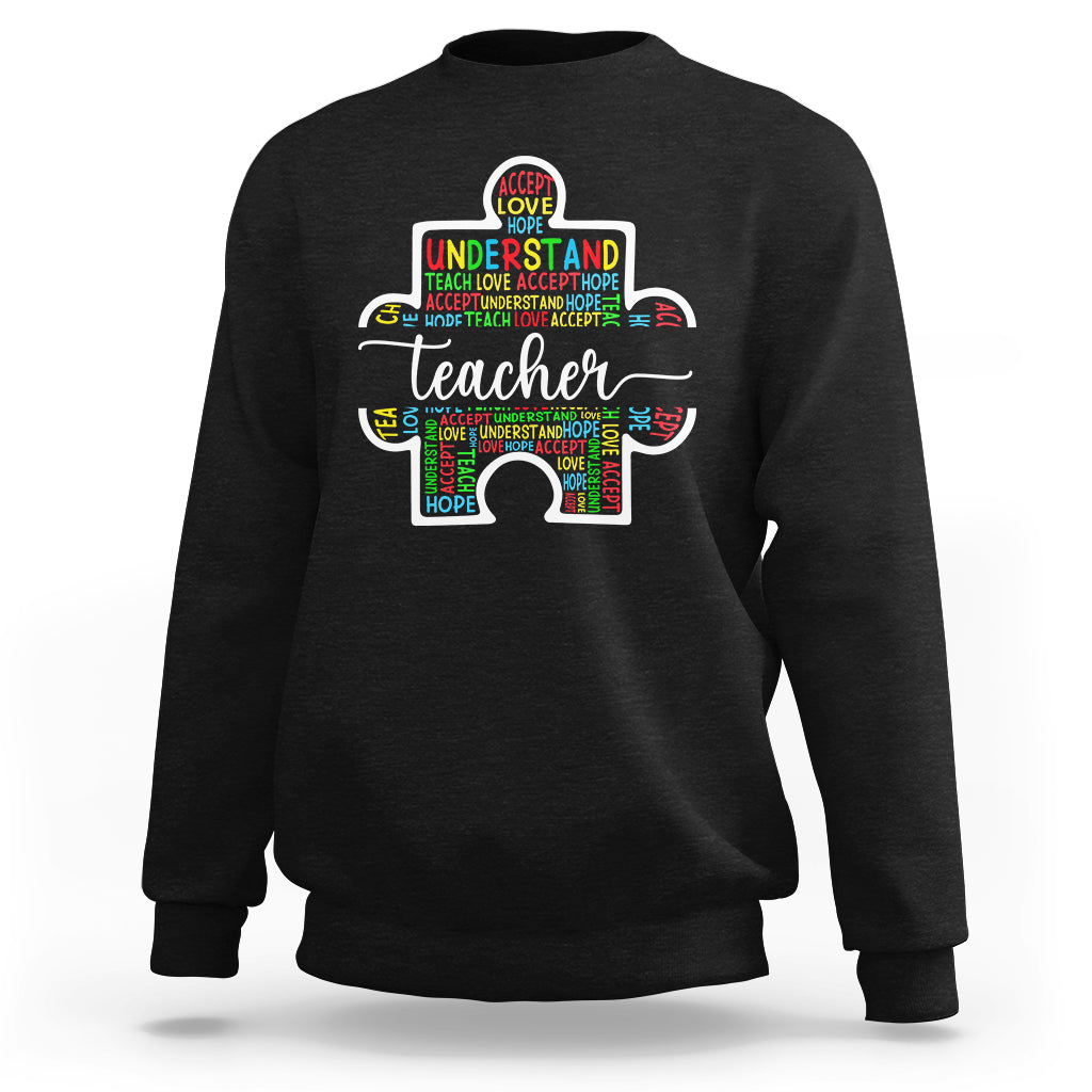 Black teacher autism awareness sweatshirt with colorful elephant graphic on chest
