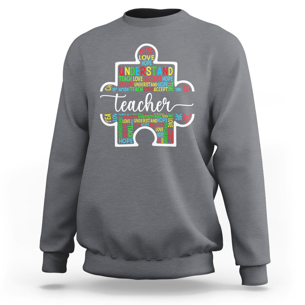 Medium gray teacher autism awareness sweatshirt with colorful elephant graphic on chest