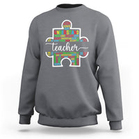 Medium gray teacher autism awareness sweatshirt with colorful elephant graphic on chest