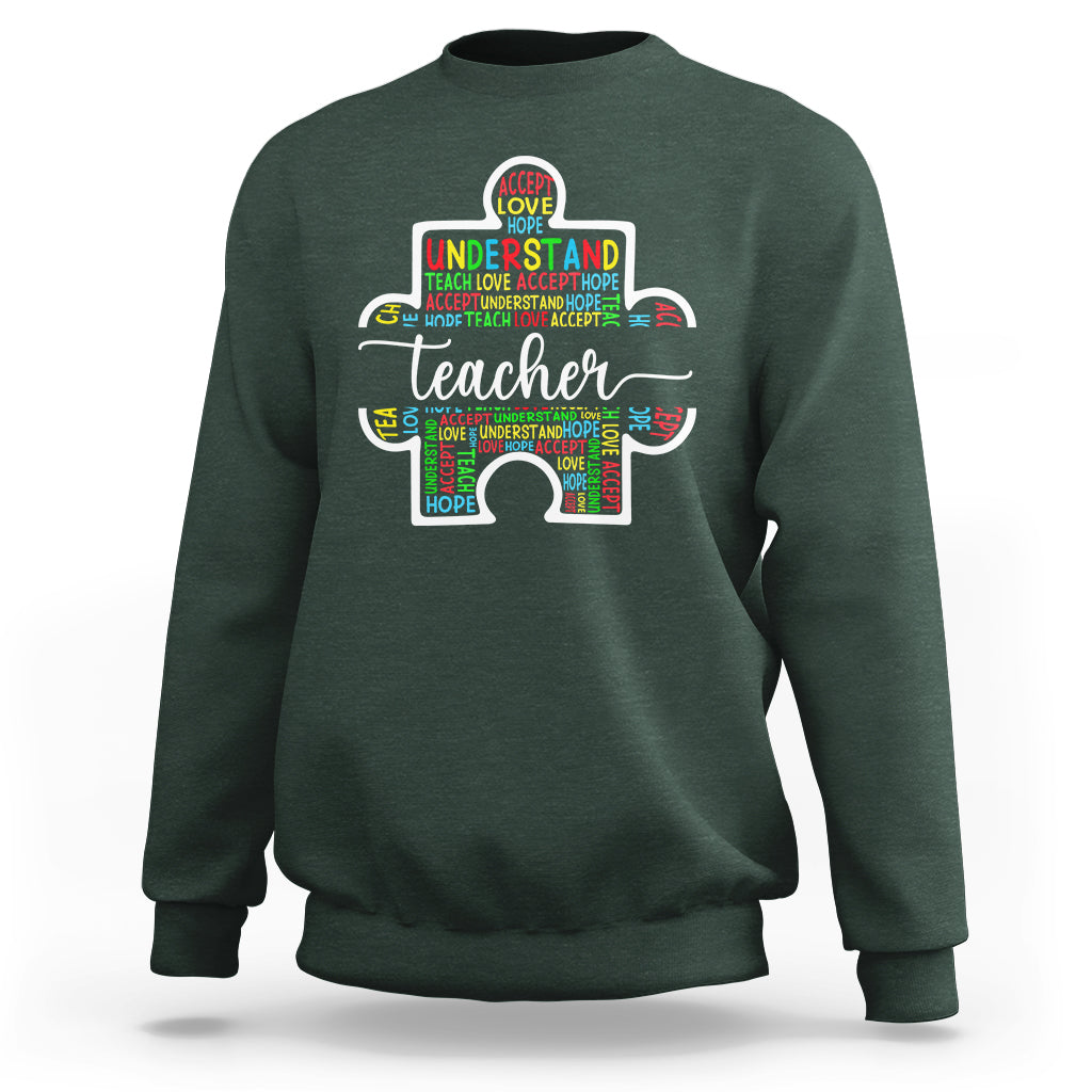 Dark forest green teacher autism awareness sweatshirt with colorful elephant graphic on chest