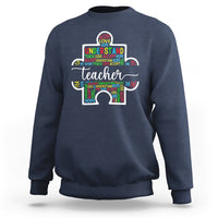 Dark blue teacher autism awareness sweatshirt with colorful elephant graphic on chest