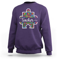 Purple teacher autism awareness sweatshirt with colorful elephant graphic on chest