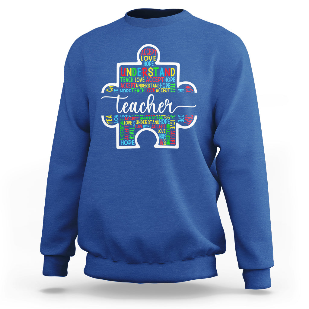 Royal blue teacher autism awareness sweatshirt with colorful elephant graphic on chest