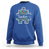Royal blue teacher autism awareness sweatshirt with colorful elephant graphic on chest