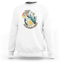 White crewneck sweatshirt with colorful “Cinco Made” boot graphic on the chest