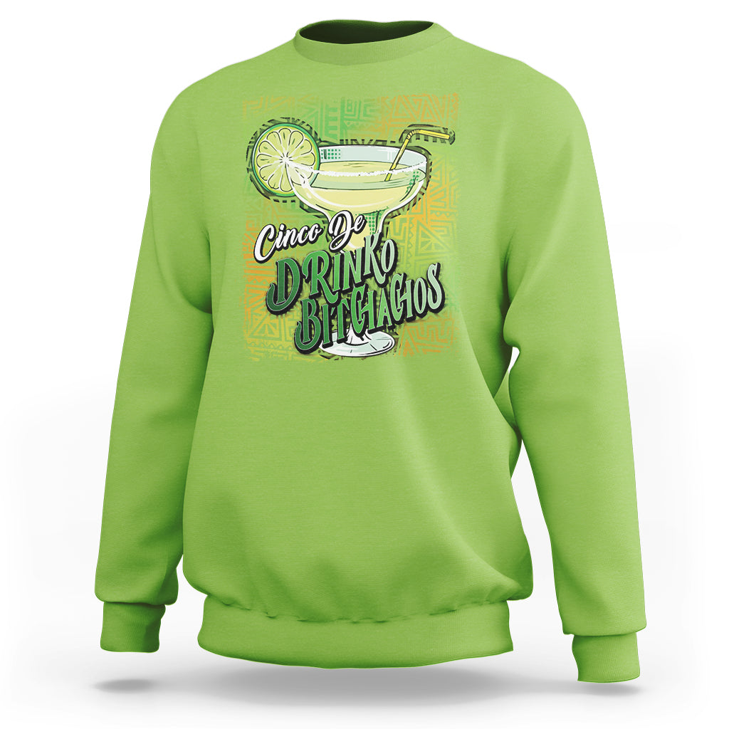 Lime green crewneck sweatshirt with colorful drink and text graphic on front