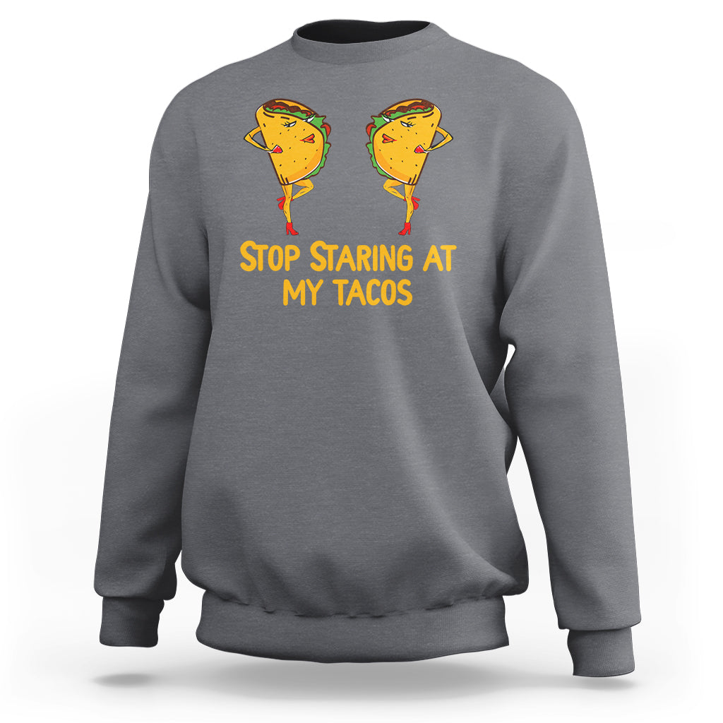 Charcoal sweatshirt with taco graphic and “Stop Staring At My Tacos” print