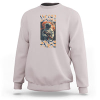 Light gray sweatshirt with astronaut “United States Space Force” graphic