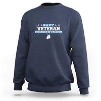 Navy crewneck sweatshirt with “Veteran Defender of Freedom” chest graphic