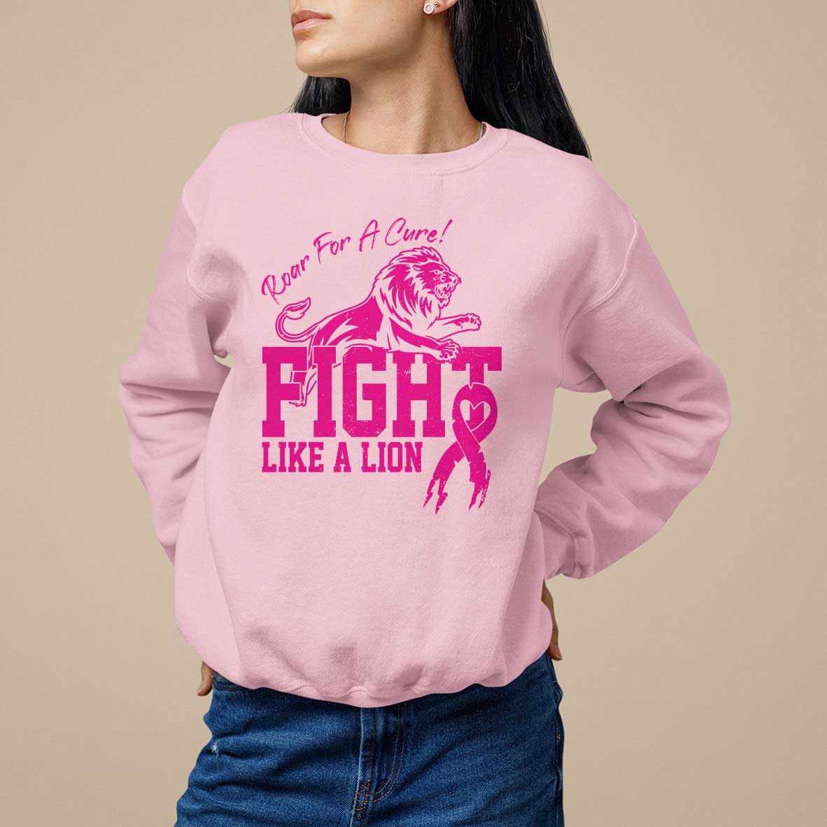 Light pink crewneck sweatshirt with pink lion 'FIGHT LIKE A LION' graphic