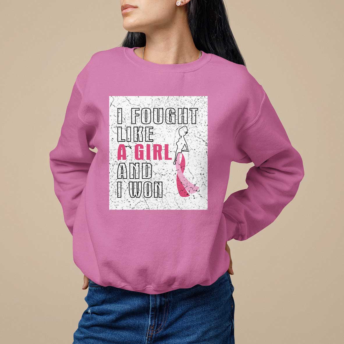 Crewneck sweatshirt in magenta/pink with square quote graphic and pink ribbon on front