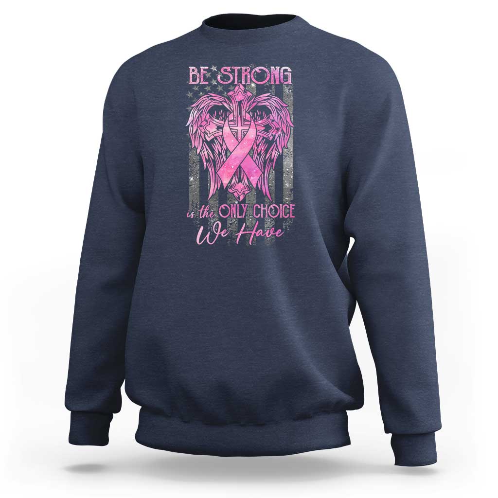 Blue crewneck sweatshirt, front view, featuring pink ribbon 'Be Strong' design