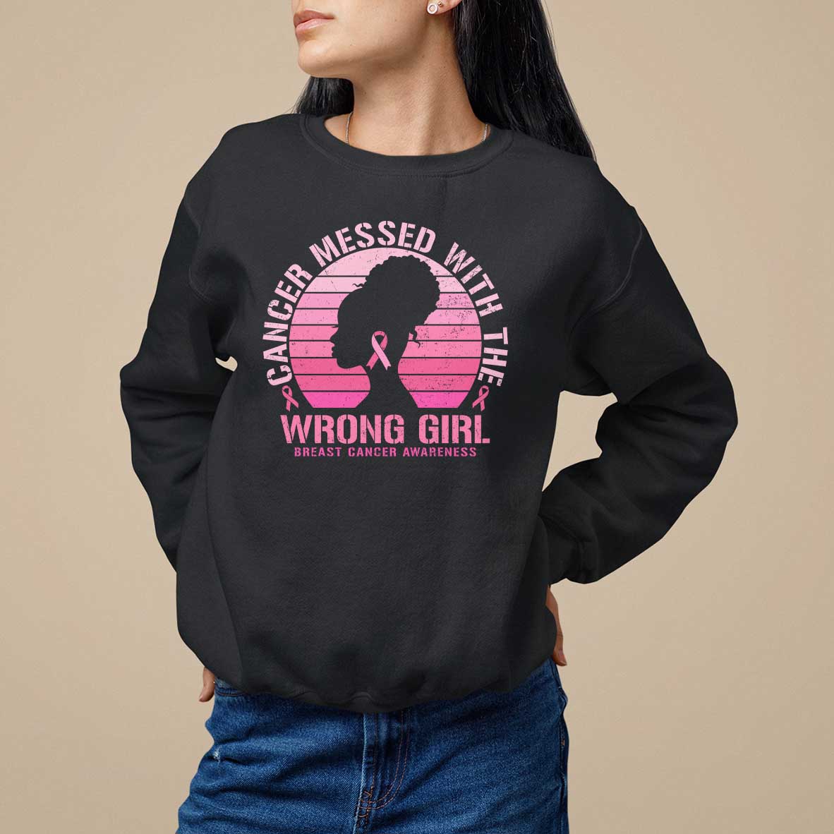 Black crewneck sweatshirt with pink breast cancer awareness graphic on front.