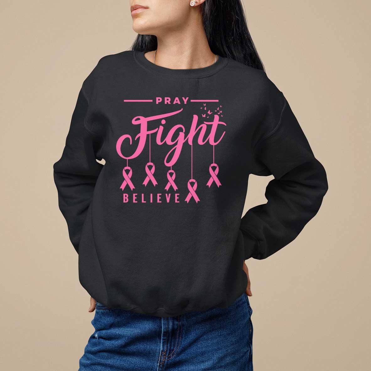 Black crewneck sweatshirt with pink "Pray Fight Believe" text and ribbon graphic.