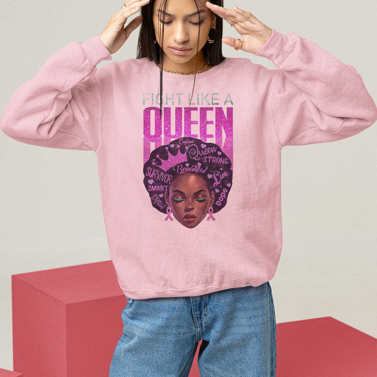 Light pink crewneck sweatshirt with “Fight Like a Queen” front graphic.