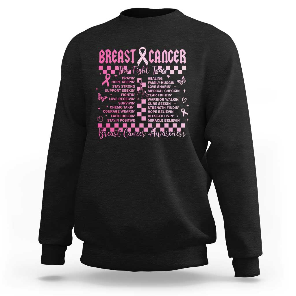 Black crewneck sweatshirt with pink breast cancer ribbon graphic on the chest