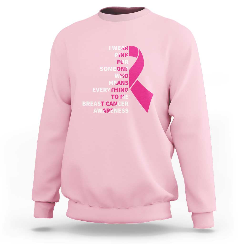 Light pink breast cancer sweatshirt with pink ribbon graphic and awareness message