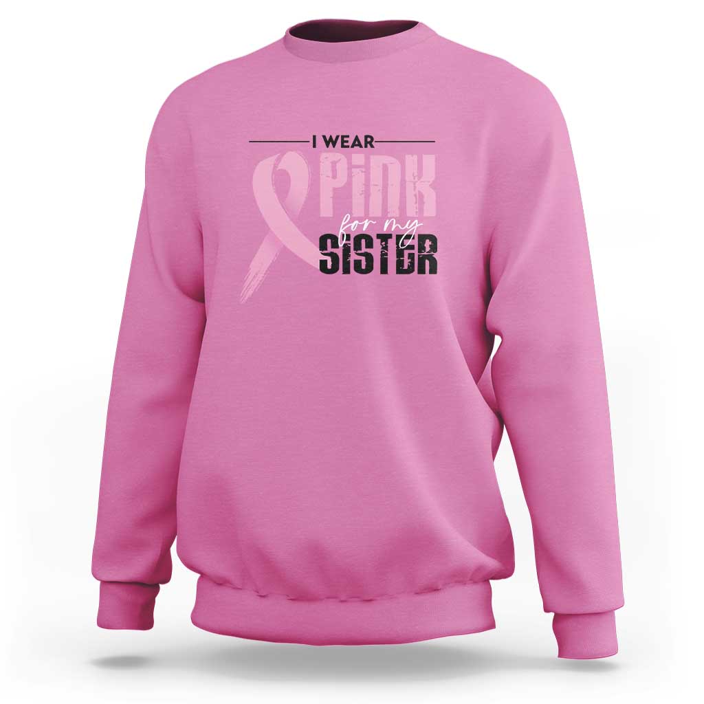 Pink breast cancer sweatshirt with pink ribbon graphic and “I wear pink for my sister” text