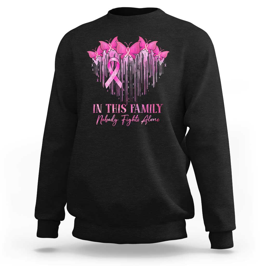 Black crewneck sweatshirt with pink ribbon and birds graphic plus family message text.