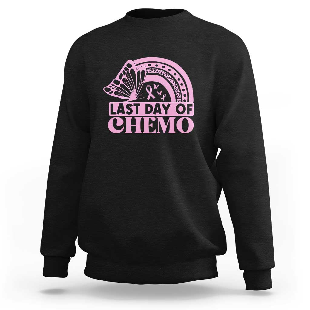 Black crewneck sweatshirt with pink ribbon fan graphic and “Last Day of Chemo” text