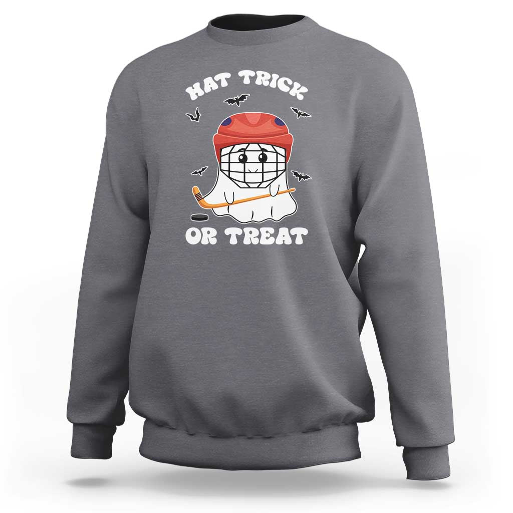 Halloween hockey sweatshirt, charcoal gray; ghost hockey player graphic with “Hat Trick or Treat”