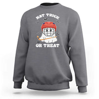 Halloween hockey sweatshirt, charcoal gray; ghost hockey player graphic with “Hat Trick or Treat”