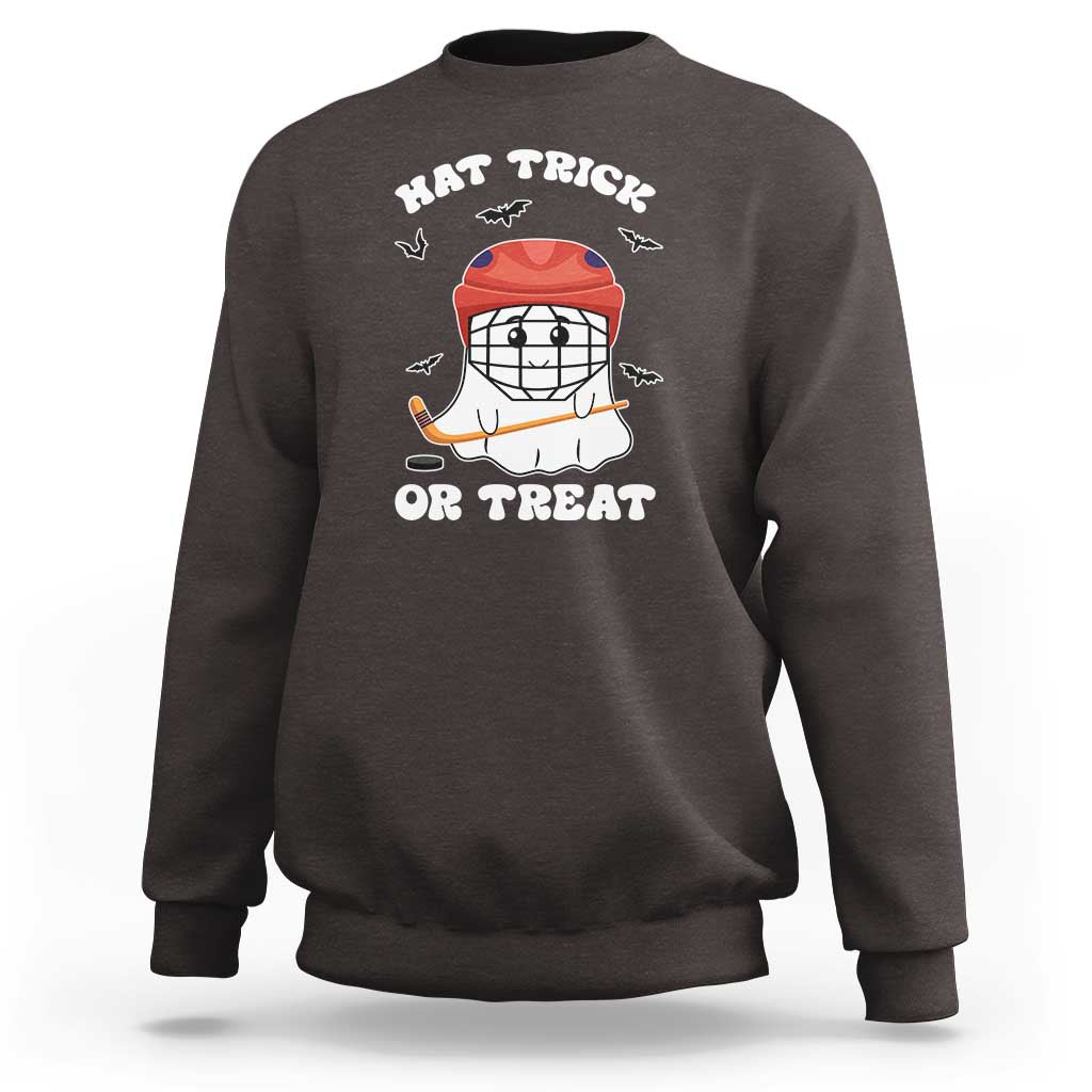 Halloween hockey sweatshirt, dark chocolate; ghost hockey player graphic with “Hat Trick or Treat”