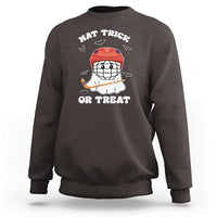 Halloween hockey sweatshirt, dark chocolate; ghost hockey player graphic with “Hat Trick or Treat”