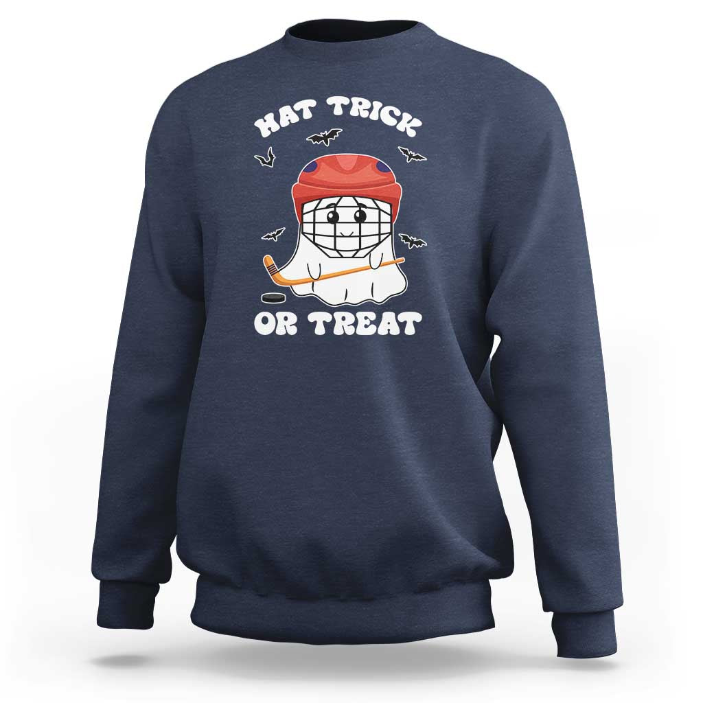 Halloween hockey sweatshirt, navy; ghost hockey player graphic with “Hat Trick or Treat”