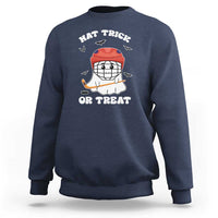 Halloween hockey sweatshirt, navy; ghost hockey player graphic with “Hat Trick or Treat”