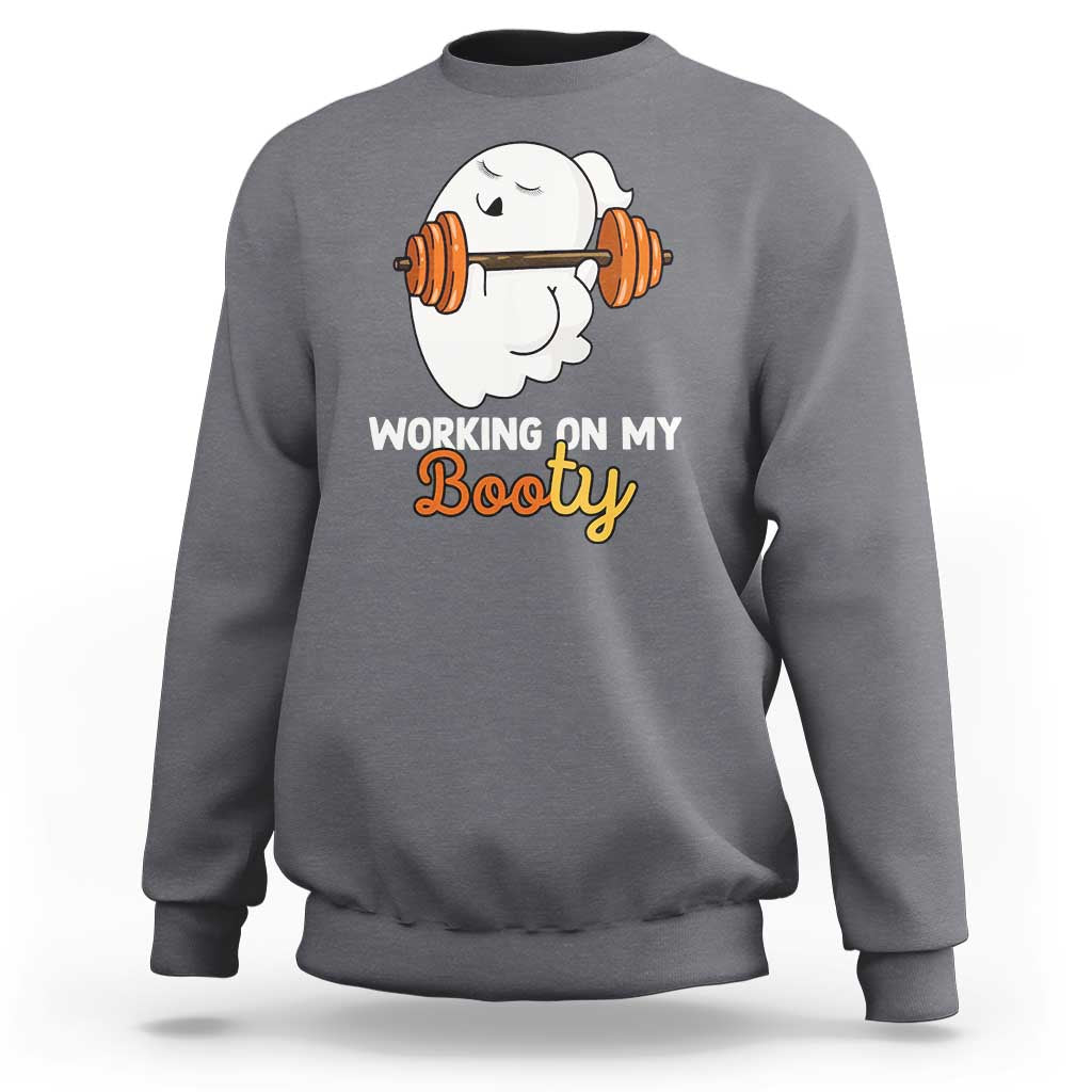 Charcoal crewneck sweatshirt with ghost lifting barbell graphic and “Working on My Booty” text