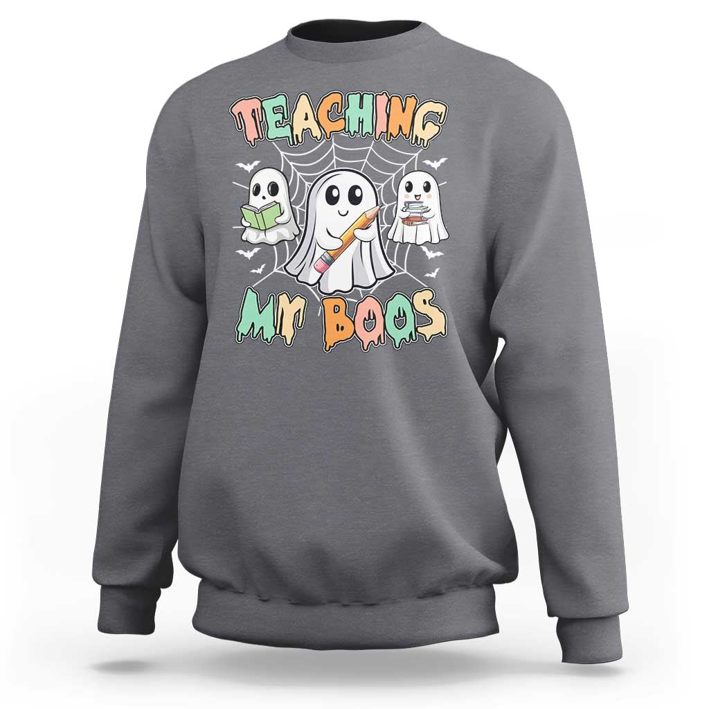 Charcoal Halloween teacher sweatshirt with cute ghost graphic and Teaching My Boos text
