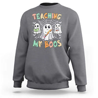Charcoal Halloween teacher sweatshirt with cute ghost graphic and Teaching My Boos text