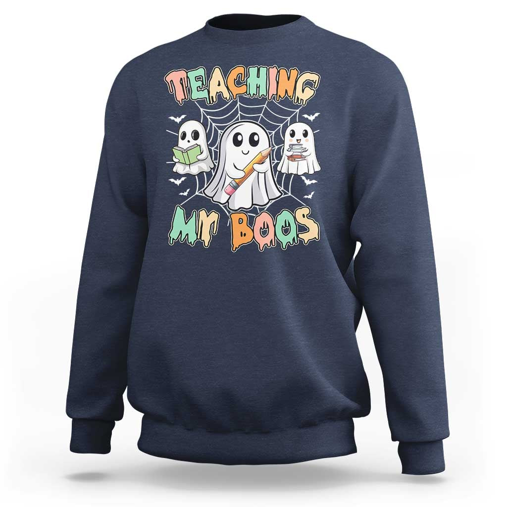 Navy Halloween teacher sweatshirt with cute ghost graphic and Teaching My Boos text