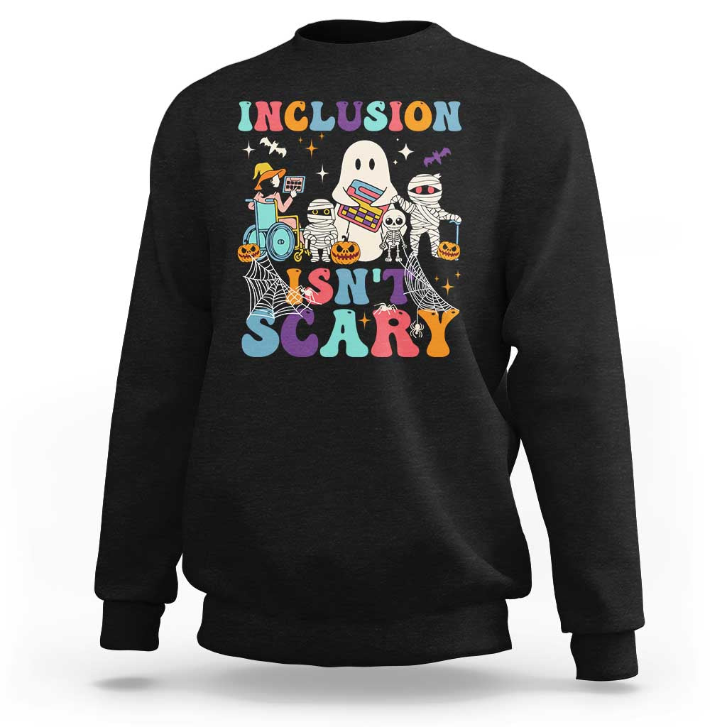 Black sweatshirt back graphic: 'Inclusion Isn't Scary' with Halloween characters