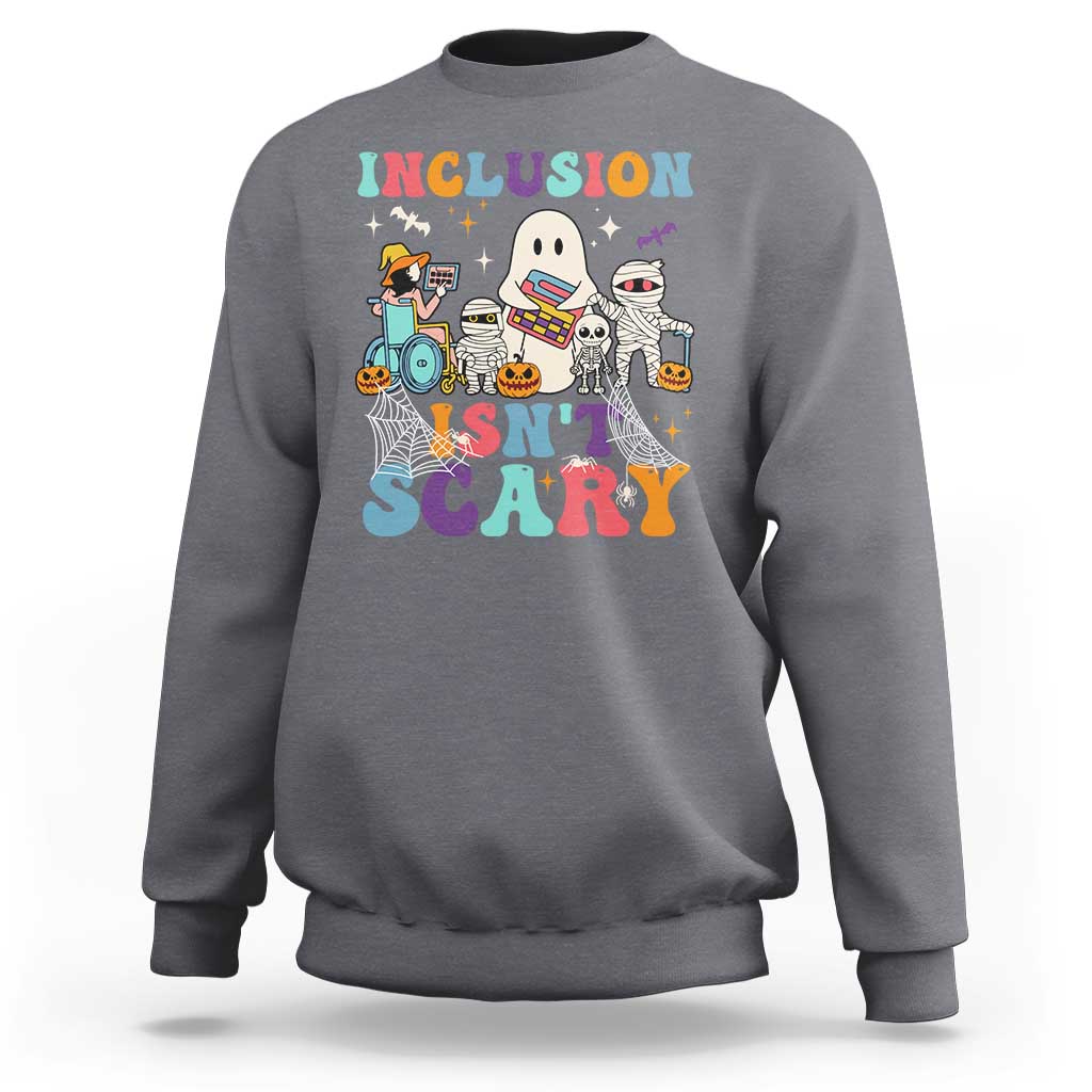 Charcoal gray sweatshirt back graphic: 'Inclusion Isn't Scary' with Halloween characters