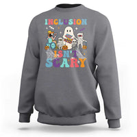 Charcoal gray sweatshirt back graphic: 'Inclusion Isn't Scary' with Halloween characters