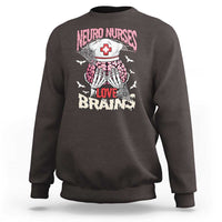 Dark chocolate brown crewneck sweatshirt with skeleton nurse and “Love Brains” graphic on back