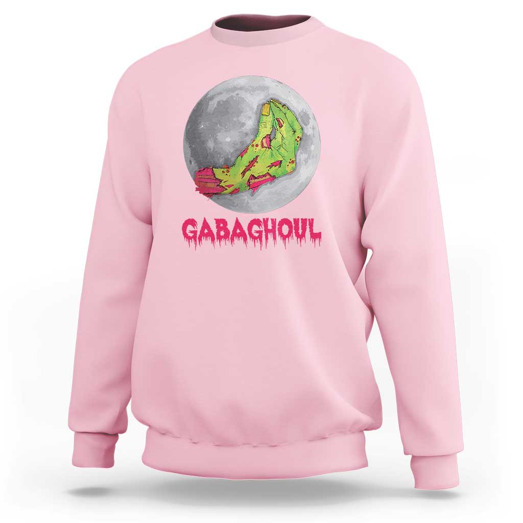 Light pink Halloween sweatshirt with zombie hand graphic and 'GABAGHOUL' text on front