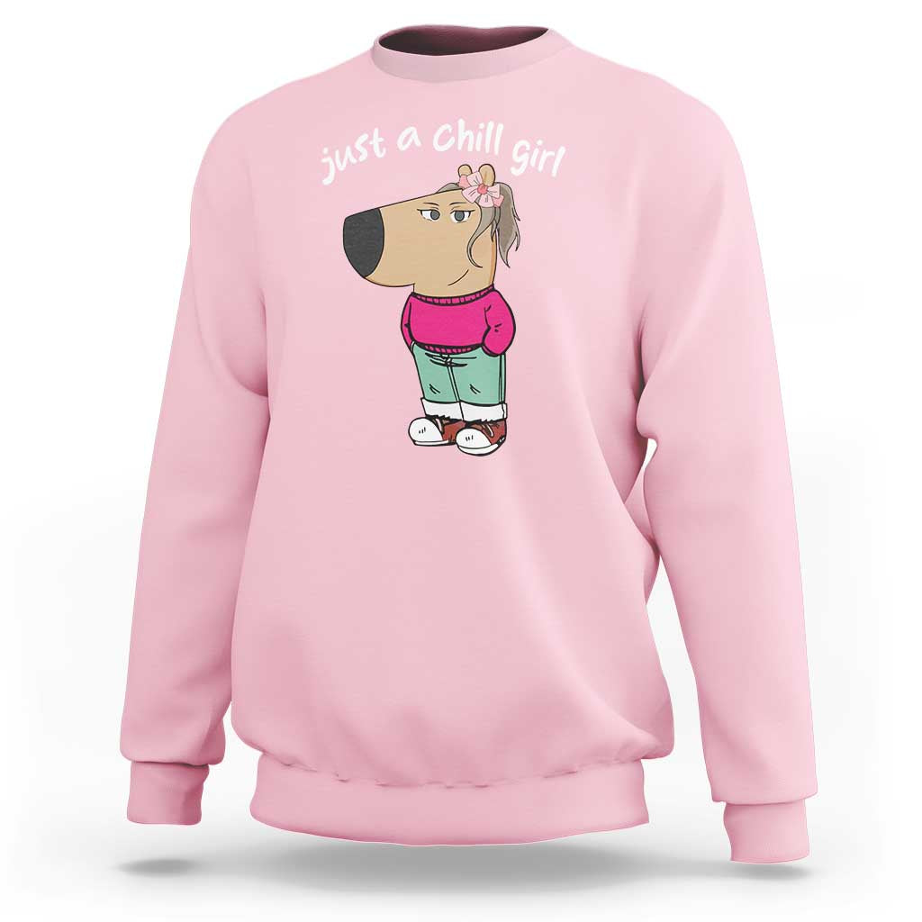 Light pink crewneck sweatshirt with girl slogan graphic on front, long sleeves