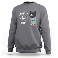 Heather gray cat graphic crewneck sweatshirt with 'just a chill cat' text