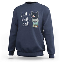 Navy blue cat graphic crewneck sweatshirt with 'just a chill cat' text