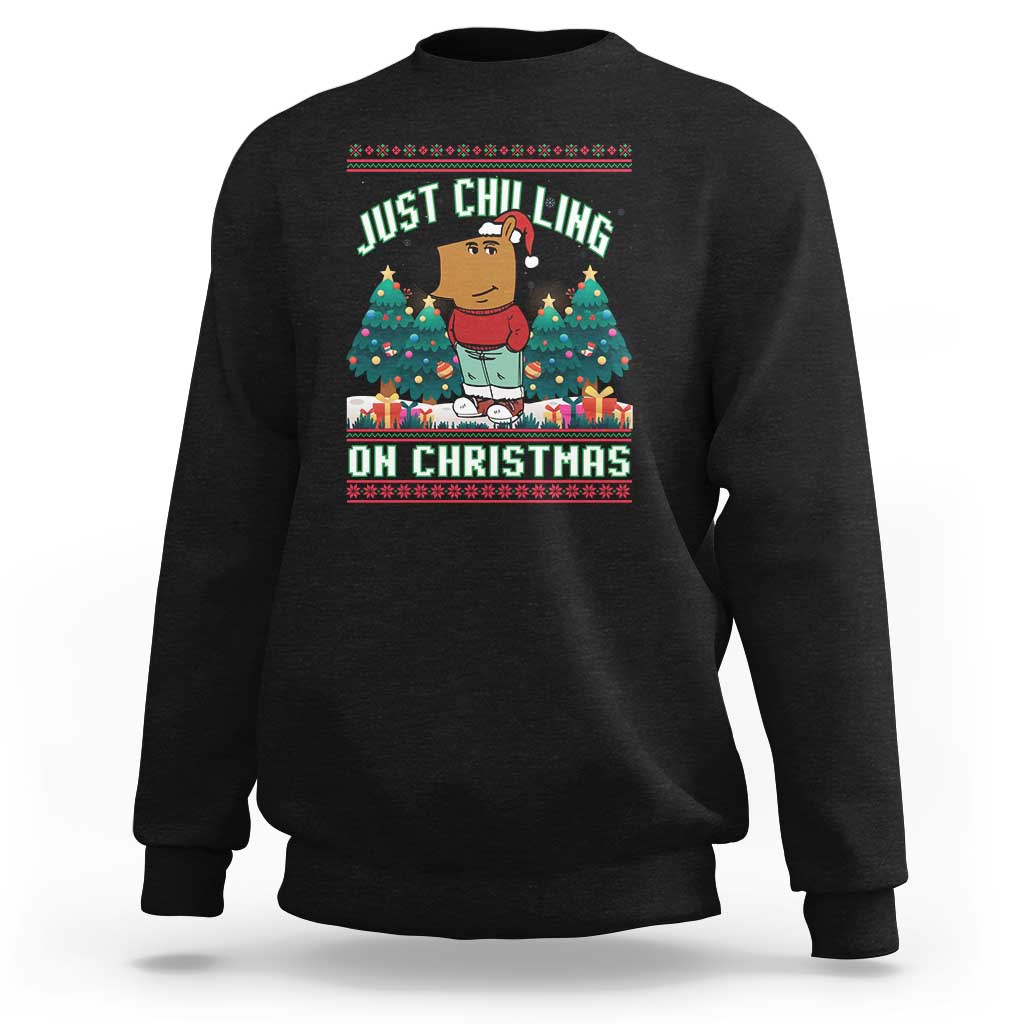 Black crewneck sweatshirt with Christmas graphic: JUST CHILLING ON CHRISTMAS