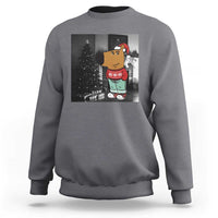 Heather gray crewneck sweatshirt with Christmas character graphic on front